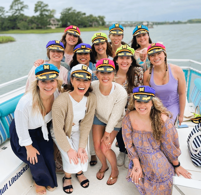 Bachelorette party having a blast in front of Windmill Harbor