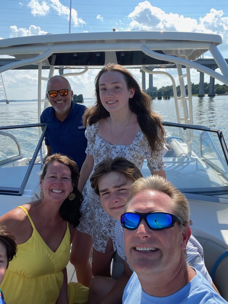 Family photo op on the bow of Key West boat